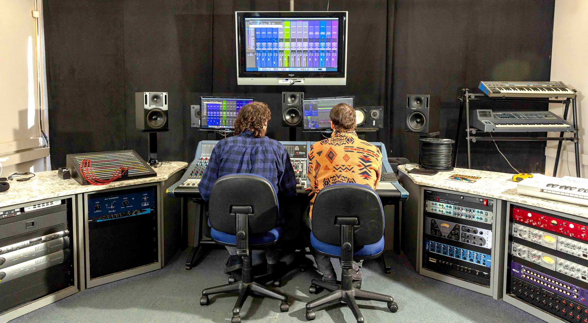 Students at a recording console